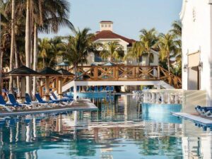 Deck chairs near swimming pool in Hotel Iberostar Playa Alameda